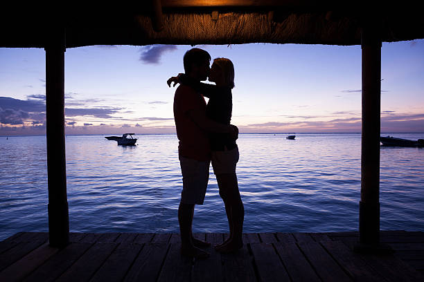 Couple kissing on beach