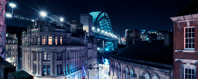 Photograph of buildings and the Tyne Bridge at Newcastle upon Tyne, England.