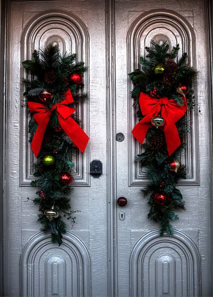 istock Christmas wreaths on a door 528931605