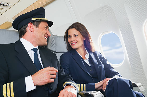 istock Flight personnel on airplane 528933349