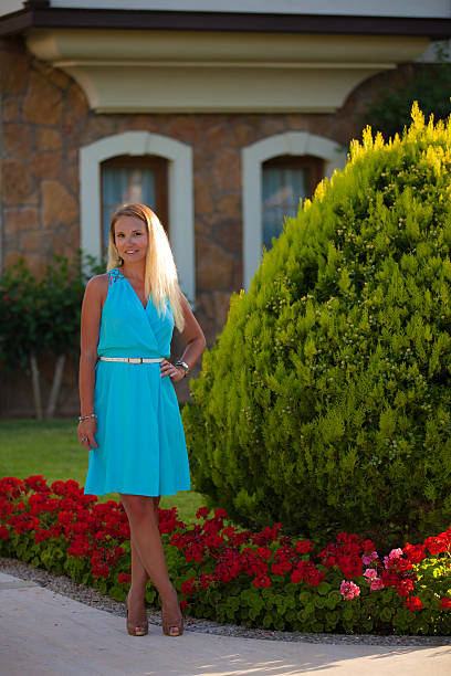 Beautiful girl in blue dress stock photo
