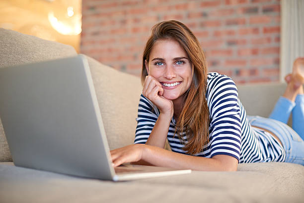 istock Lazying about with my laptop 528933709