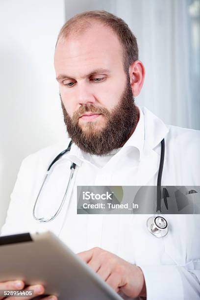 Portrait Of A Doctor With Tablet Computer Stock Photo - Download Image Now - Adult, Adults Only, BART