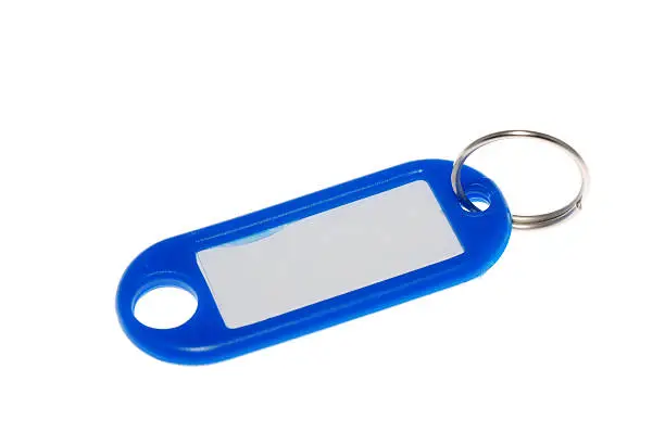 Blue plastic keyholder on white background