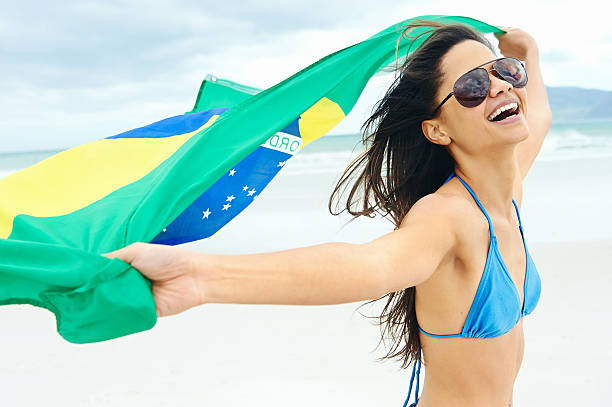istock Brazil flag woman fan 528954565