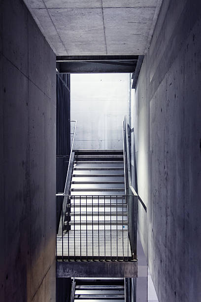 istock steel staircase with beton wall 528955165