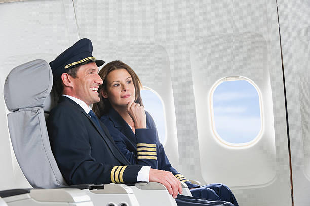 istock Flight personnel on airplane 528955747
