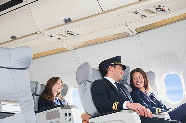 istock Flight personnel on airplane 528955751