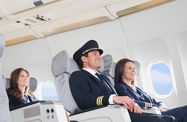istock Flight personnel on airplane 528955793