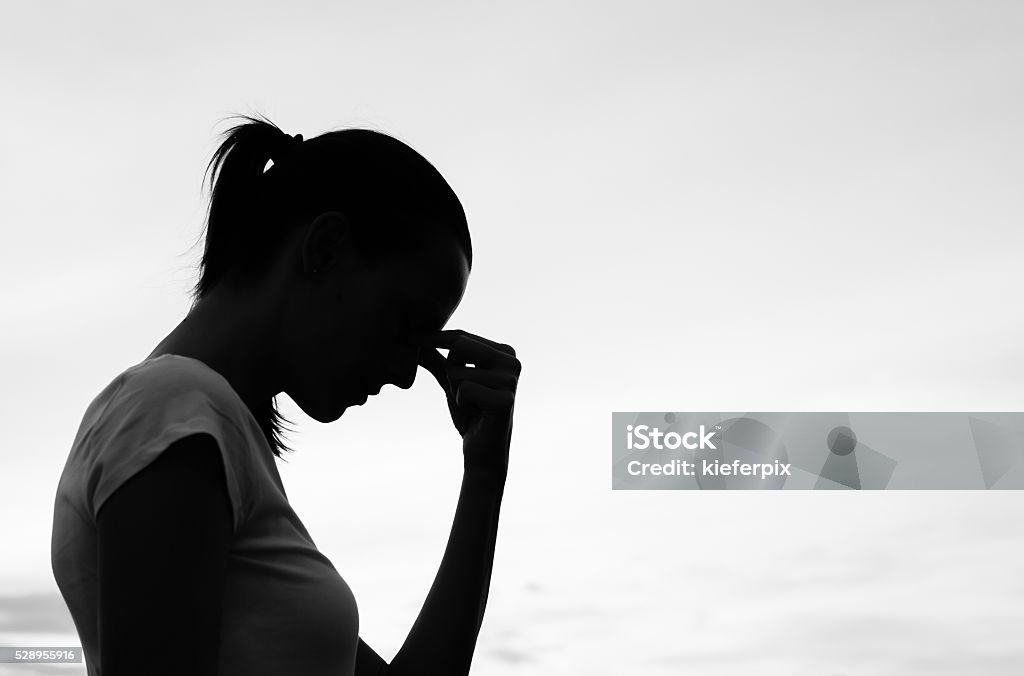 Sadness Sad young woman. Mental Health Stock Photo