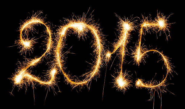 istock Happy New Year - 2015 with sparklers 528956295