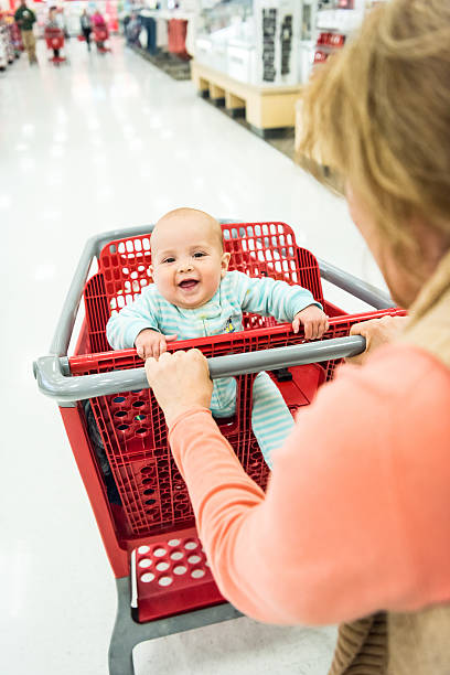 istock Shopping with her baby 528956792