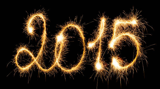 istock Happy New Year - 2015 with sparklers 528957173