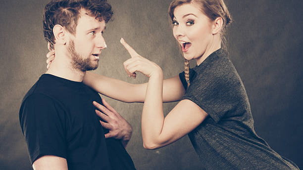 istock Woman applying cream to her man face. 528957500