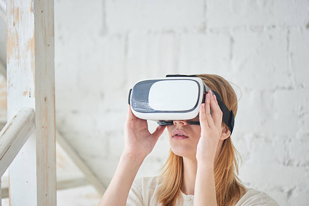 istock The girl in a virtual reality helmet 528957746