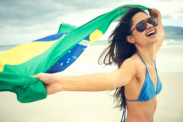 istock Brazil flag woman fan 528958567