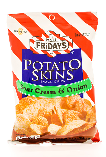Winneconne, WI, USA  - 18 June 2015: Bag of T.G.I. Potato skins chips in sour cream and onion flavor