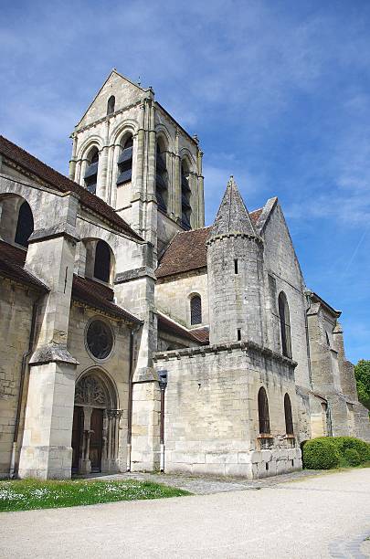 Church in Auvers Sur Oise, France Catholic Church in the small village of Auvers Sur Oise near Paris in France, Europe auvers sur oise photos stock pictures, royalty-free photos & images