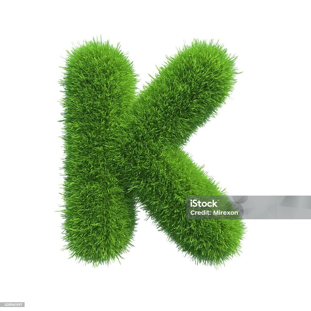 Letter of green fresh grass isolated on a white background. Letter of green fresh grass isolated on a white background Letter K Stock Photo