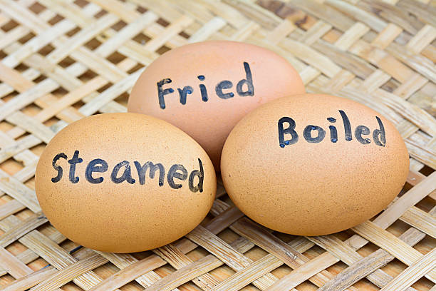 istock eggs with  word steamed,boiled,fried on  for food concept 528961903