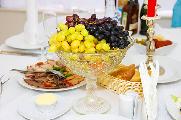 istock Grapes in a vase on the holiday table 528964296