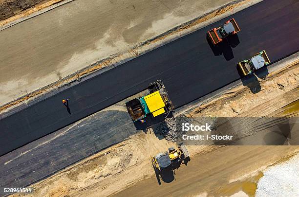 Road Rollers Working On The Construction Site Aerial View Stock Photo - Download Image Now