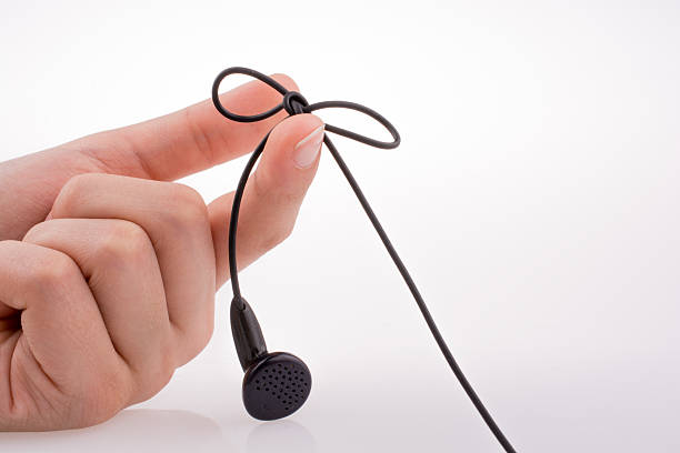 istock Hand holding a earphone 528966198
