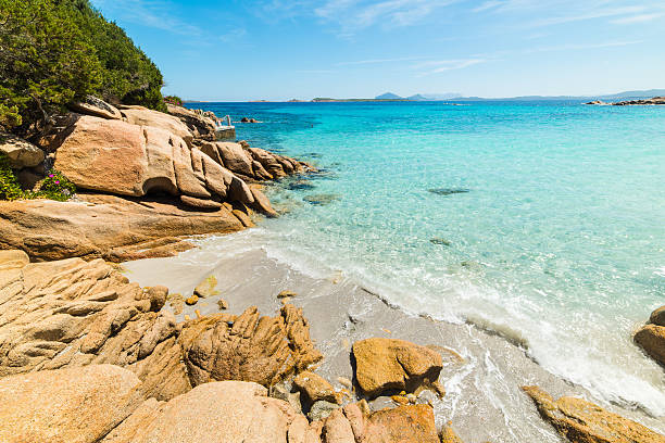 istock rocks in Capriccioli beach in Sardinia 528966548