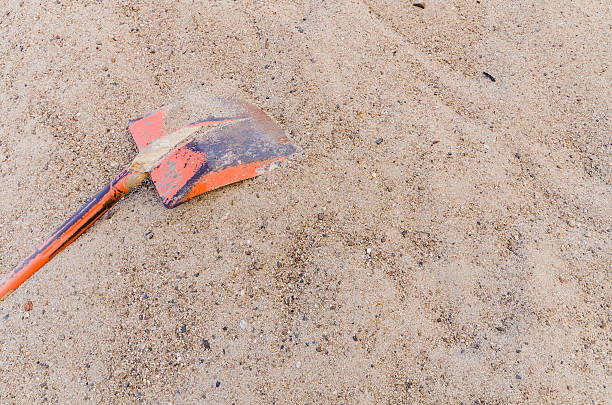 istock Shovel on the sand  pile. 528967074