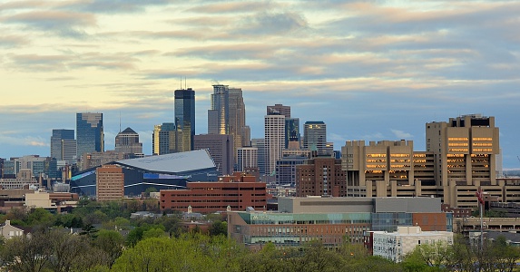 Minneapolis, USA - April 22 2016: Downtown Minneapolis Skyline with Minnesota Vikings US Bank Stadium and the University of Minnesota