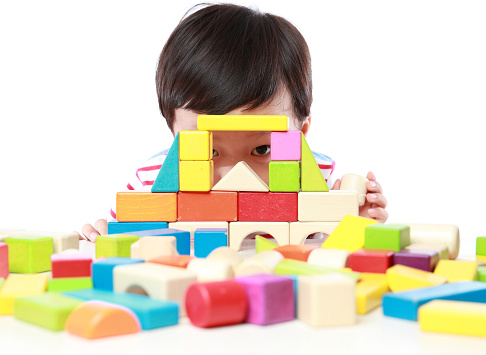 Cute asian Children playing with blocks 
