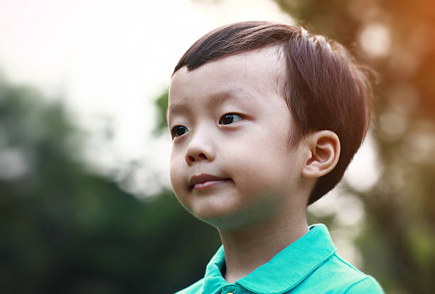 istock Cute children playing in the park 528971266