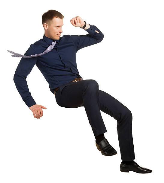 istock Businessman in a falling position, on white 528973850