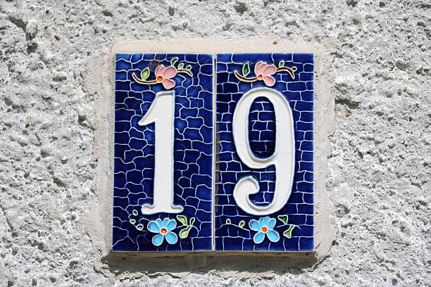 istock house number nineteen at old stone wall 528973878