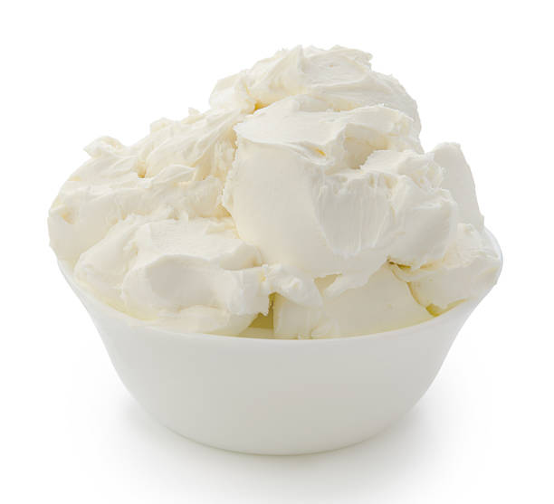 istock Mascarpone isolated on white background with clipping path 528974156