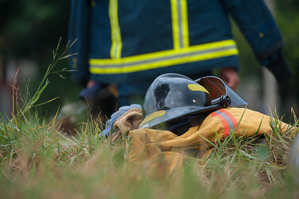 istock Heavy Duty Protective Fire Fighting Cloth, Gloves, Helmet, Jacke 528974920