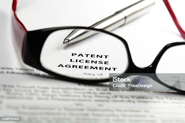 Patent License Agreement Stock Photo - Download Image Now - Intellectual Property, Non-Disclosure Agreement, Authority