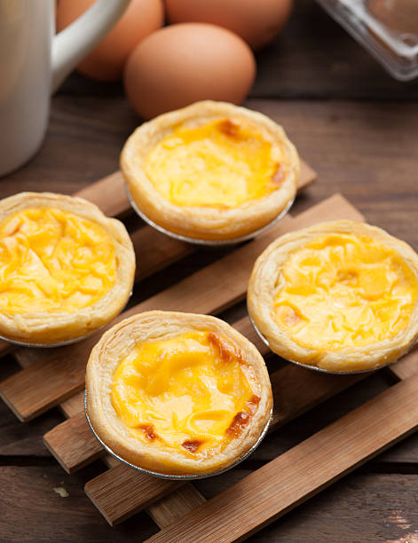 istock delicious portuguese egg tart on wood background 528978962