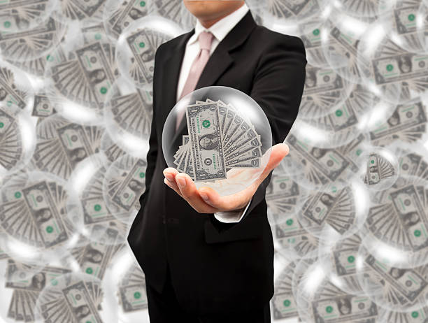 istock Ball dollars in the hands. 528979893