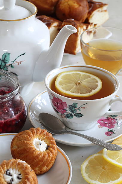 istock Still-life with fresh tea both a juicy lemon 528980335