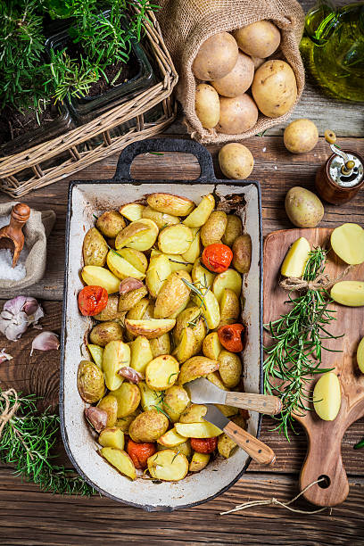 istock Freshly baked potatoes with rosemary and garlic 528980539