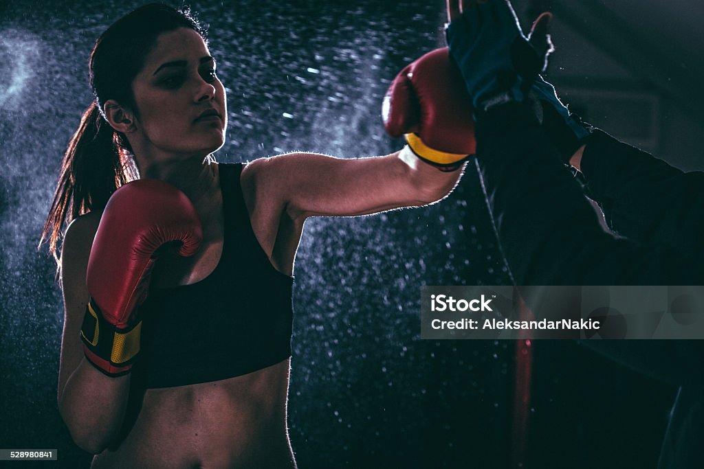 Girl boxing Portrait of a girl boxing 20-29 Years Stock Photo