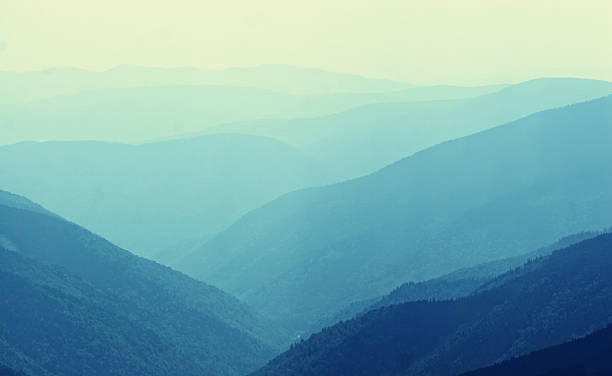 istock Mountain landscape in the fog 528982343