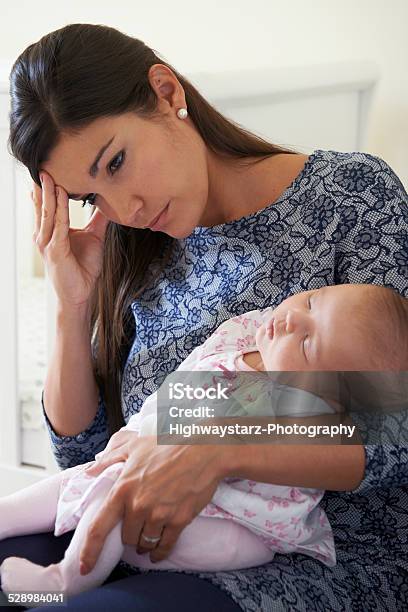 Tired Mother Suffering From Post Natal Depression Stock Photo - Download Image Now - Postpartum Depression, Mother, Tired