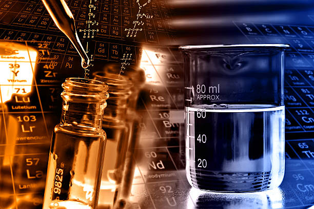 istock dropping liquid to test tube 528984264
