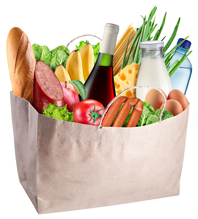 Paper bag with food isolated on a white background. File contains clipping path.