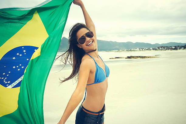 istock Brazil flag woman fan 528985537