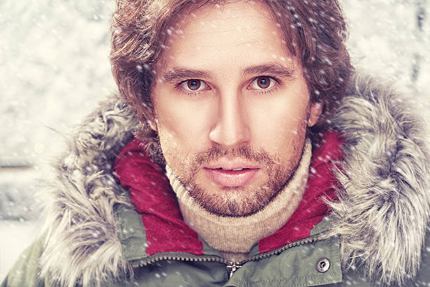 istock brutal face of man with beard bristles winter 528986469