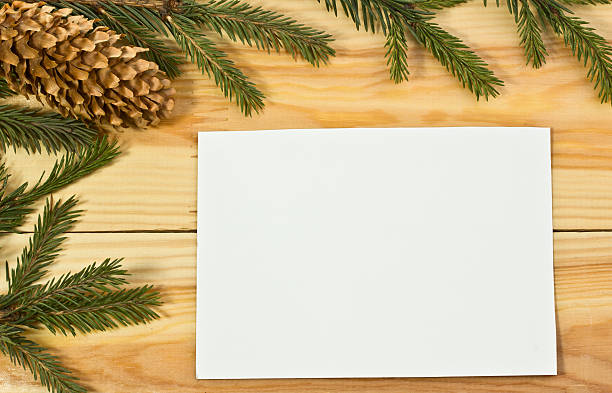 istock The spruce branches on a wooden board 529001139