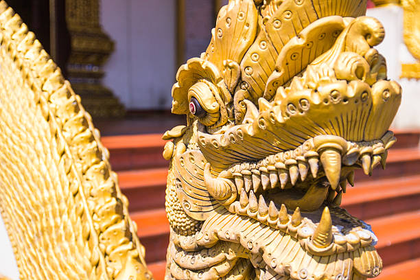 istock golden naga in Thai temple 529001493